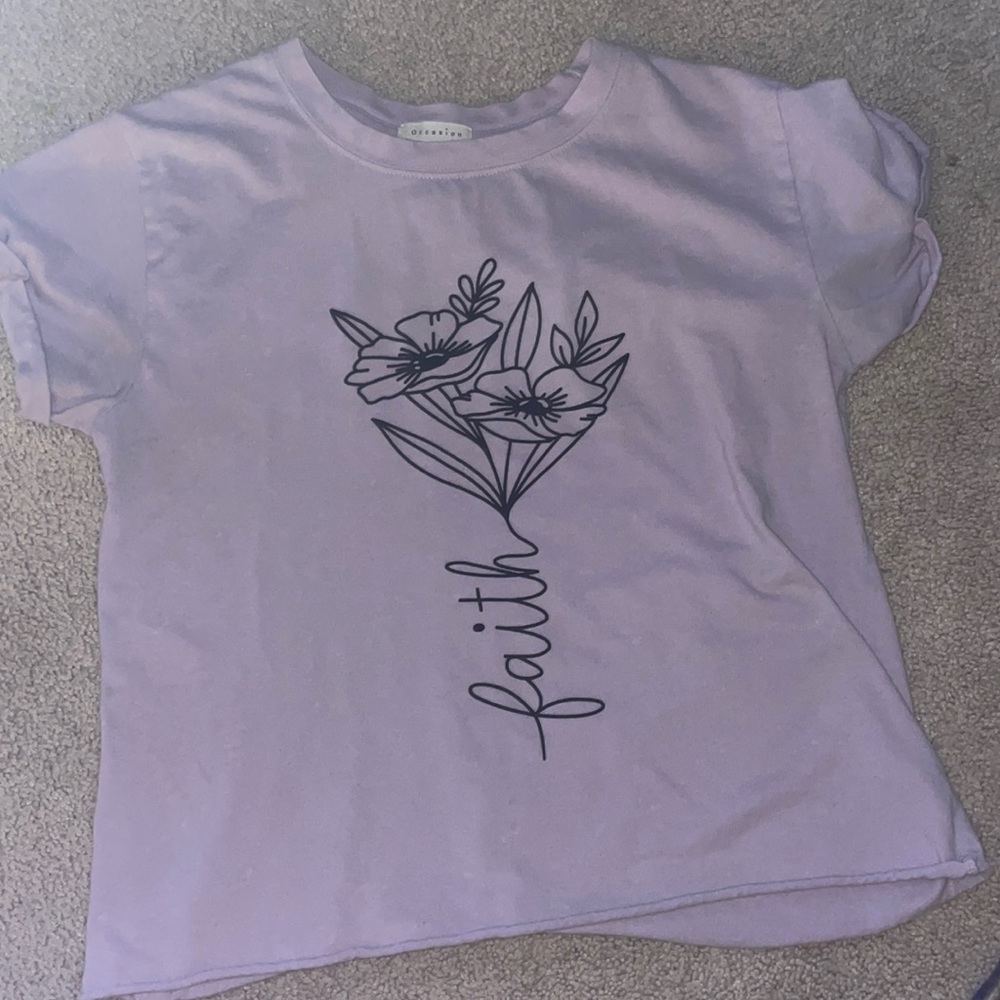A purple Shirt it’s not damaged only worn a few times